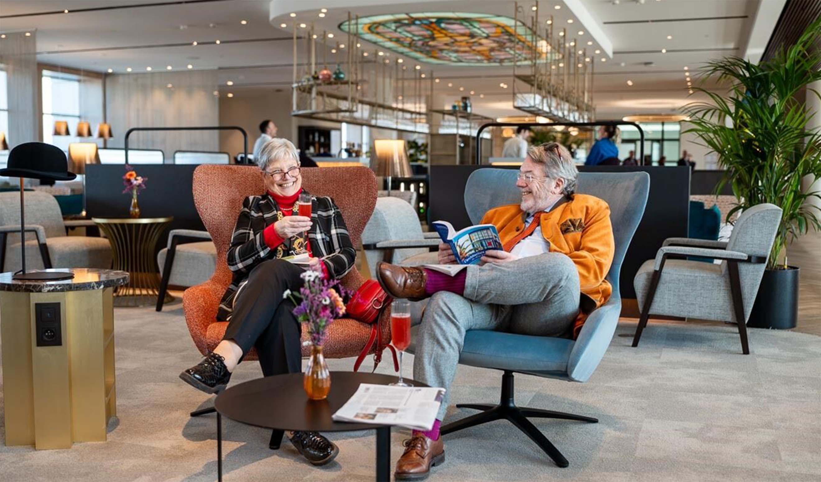 Two people seated in The View lounge