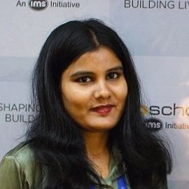 Green double couch with wooden legs