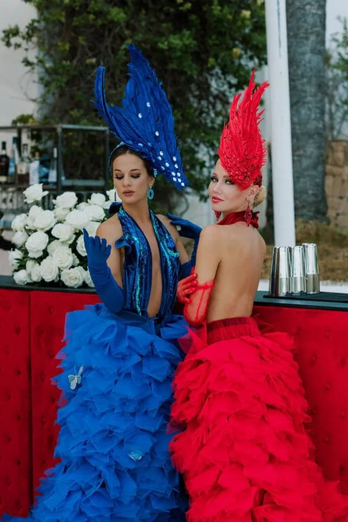 This is tow ladies at the bar dressed for an event