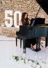 This is an image of a private event in ibiza and pianist performing