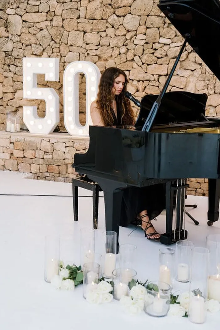 This is an image of a private event in ibiza and pianist performing