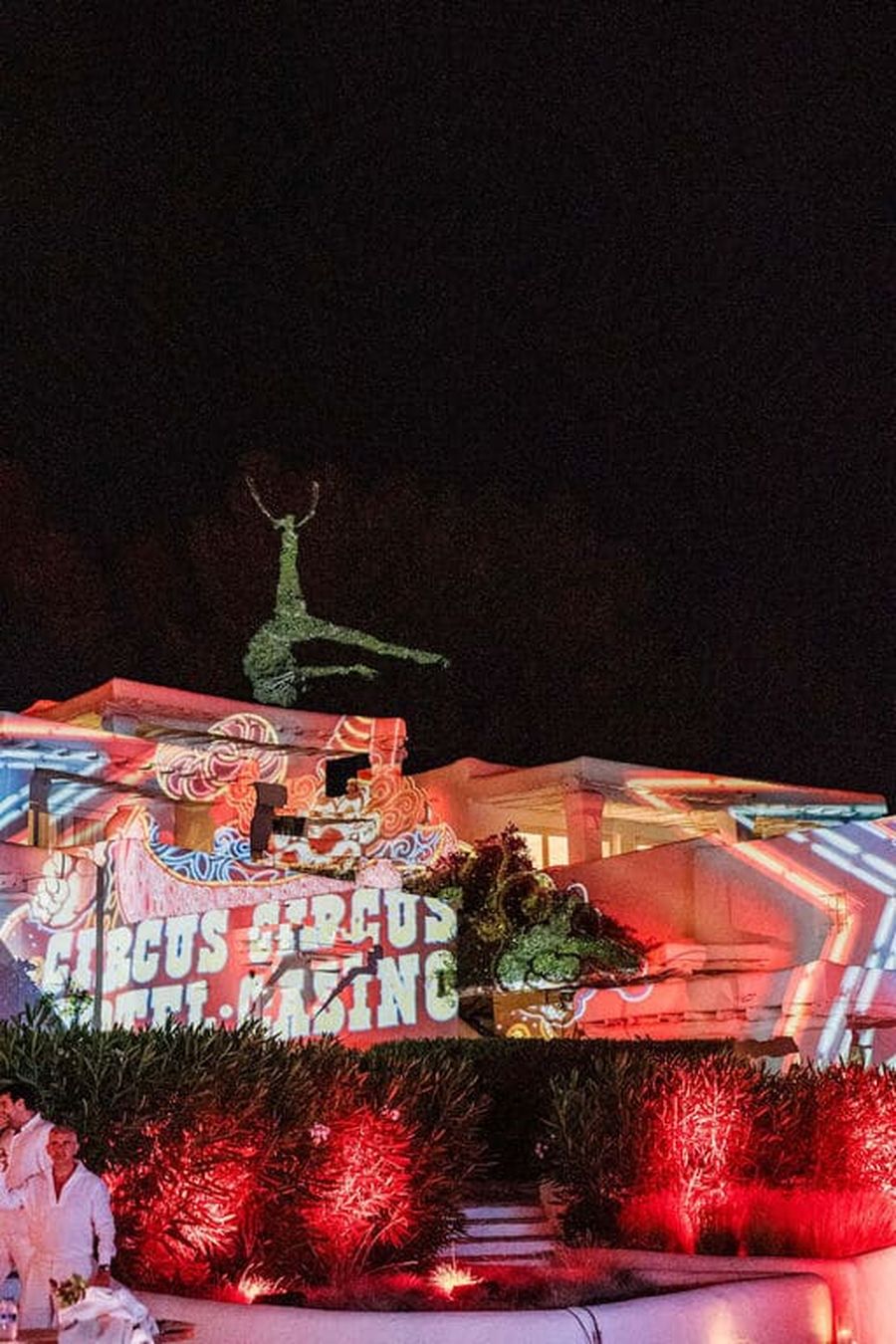 Wedding studio 54 in a private villa in Ibiza by Bliss Ibiza Wedding Planner with a very high end band in Ibiza and a mapping on a walls