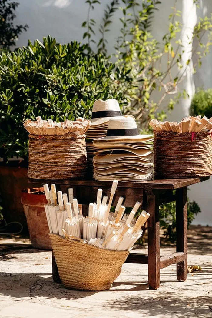 Cecilia and Dylan envisioned a wedding that would honour their Jewish heritage while embracing the beauty of the Mediterranean — every detail carefully crafted to blend sacred tradition with island elegance. With a later start time, the June heat had softened into the most perfect evening warmth. Guests gathered between the trees as the couple took their places beneath a beautifully adorned chuppah, dressed in flowers that felt like a natural extension of the garden. A liberal rabbi, flown in especially for the occasion, led a deeply moving ceremony rooted in Jewish tradition. The breaking of the glass was met with joyful cries of Mazel Tov from all 140 guests. As guests arrived, the ladies were greeted with personalised fans and the gentlemen with hats — a small summer touch that went a long way under the Ibiza sky. It is exactly these details that transform a beautiful wedding into an unforgettable one.