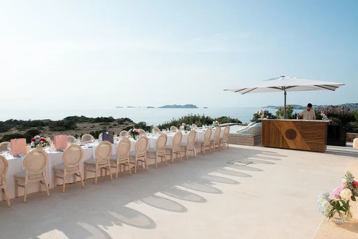 Wedding dinner table with ocean panorama