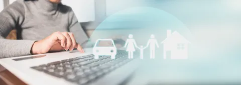 insurance-concept-businessman-with-car-family