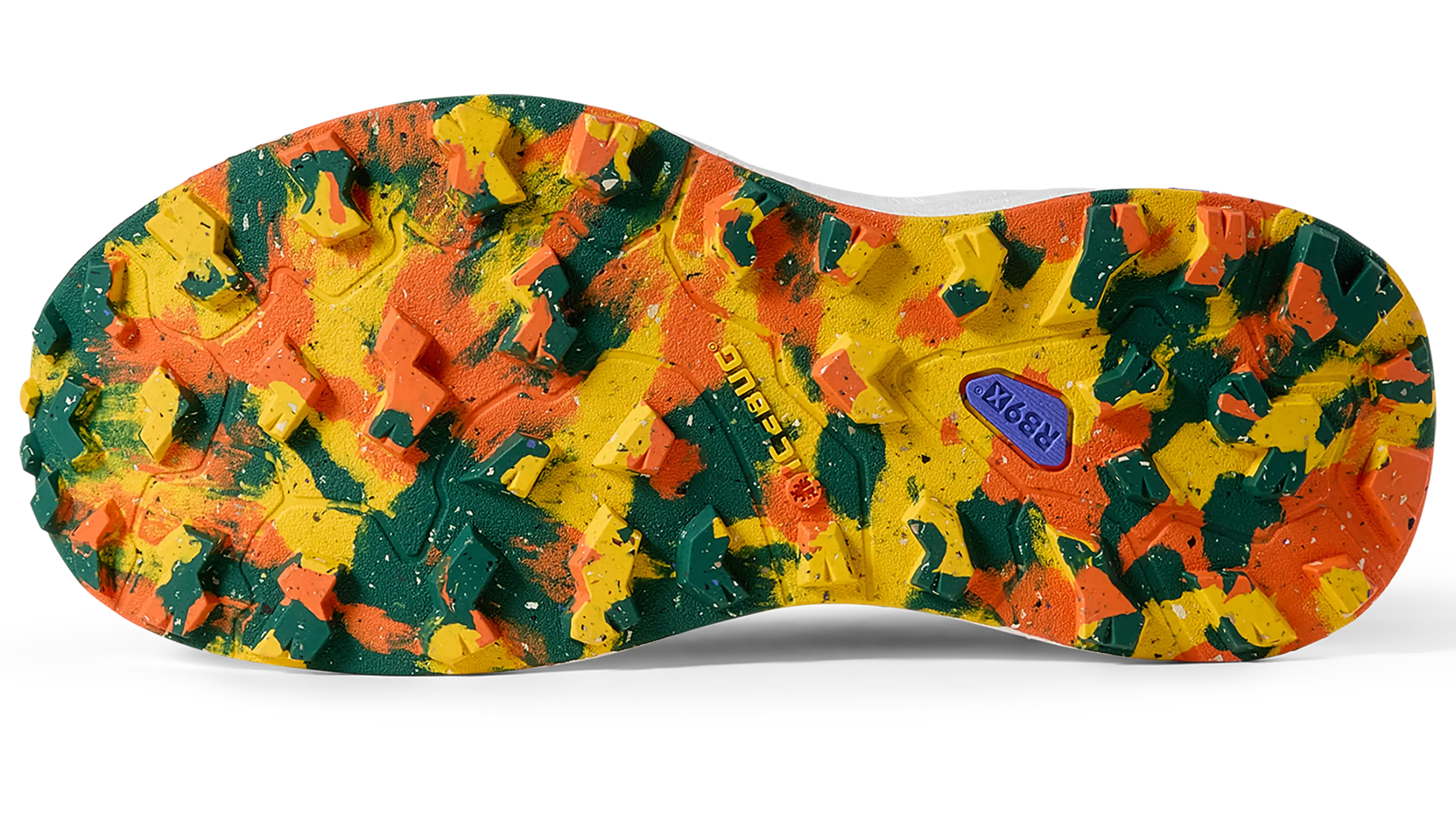 Colorful running shoe sole with a mix of green, orange, and yellow camo pattern, featuring textured grips and the brand name in the center.