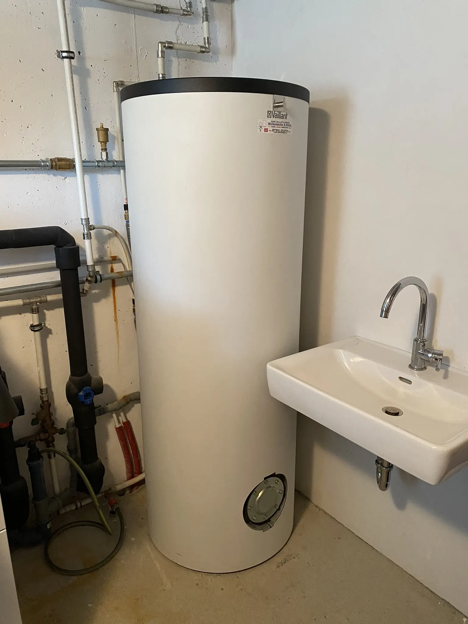 Hot water tank in basement, prepared for connection of the AC ELWA 2.