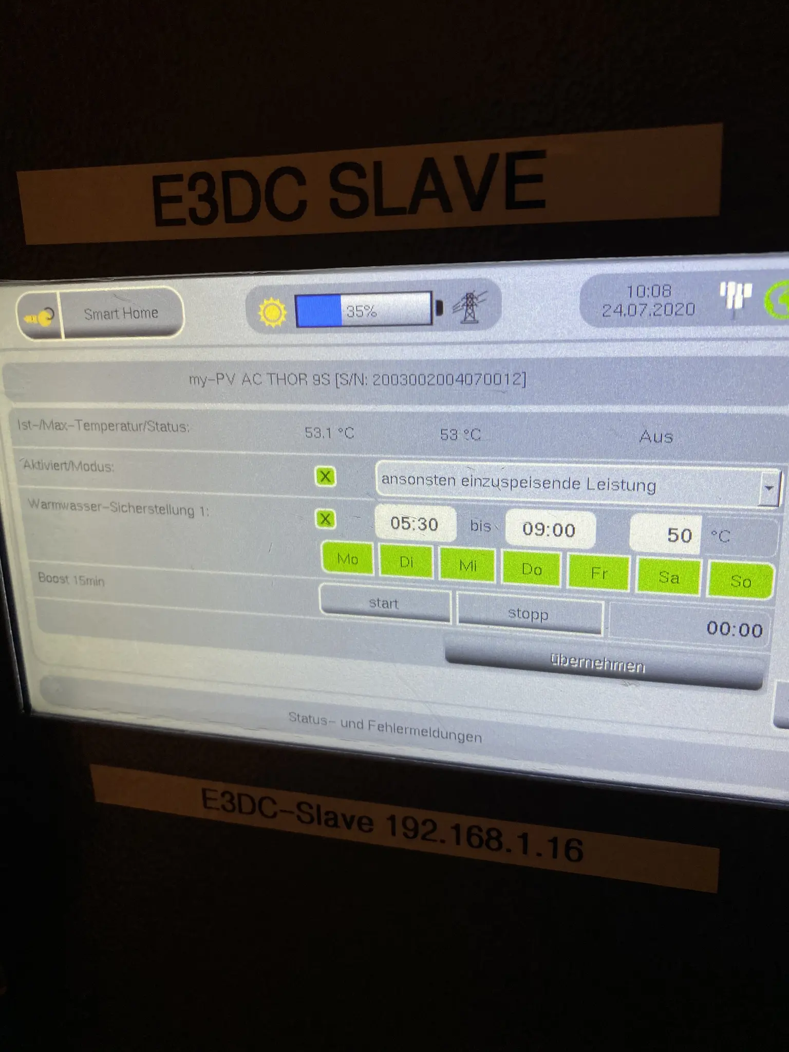 Control panel display showing temperature, status, and settings.