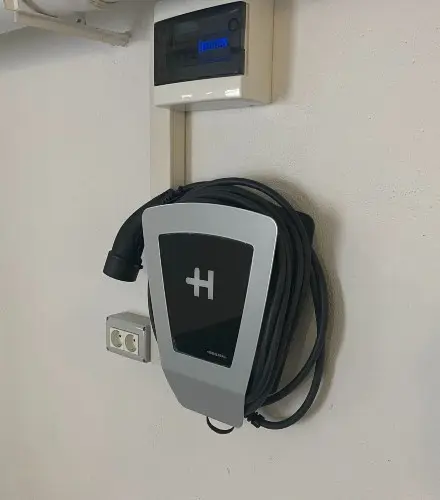 Wall-mounted electrical switch cabinet and inverter.