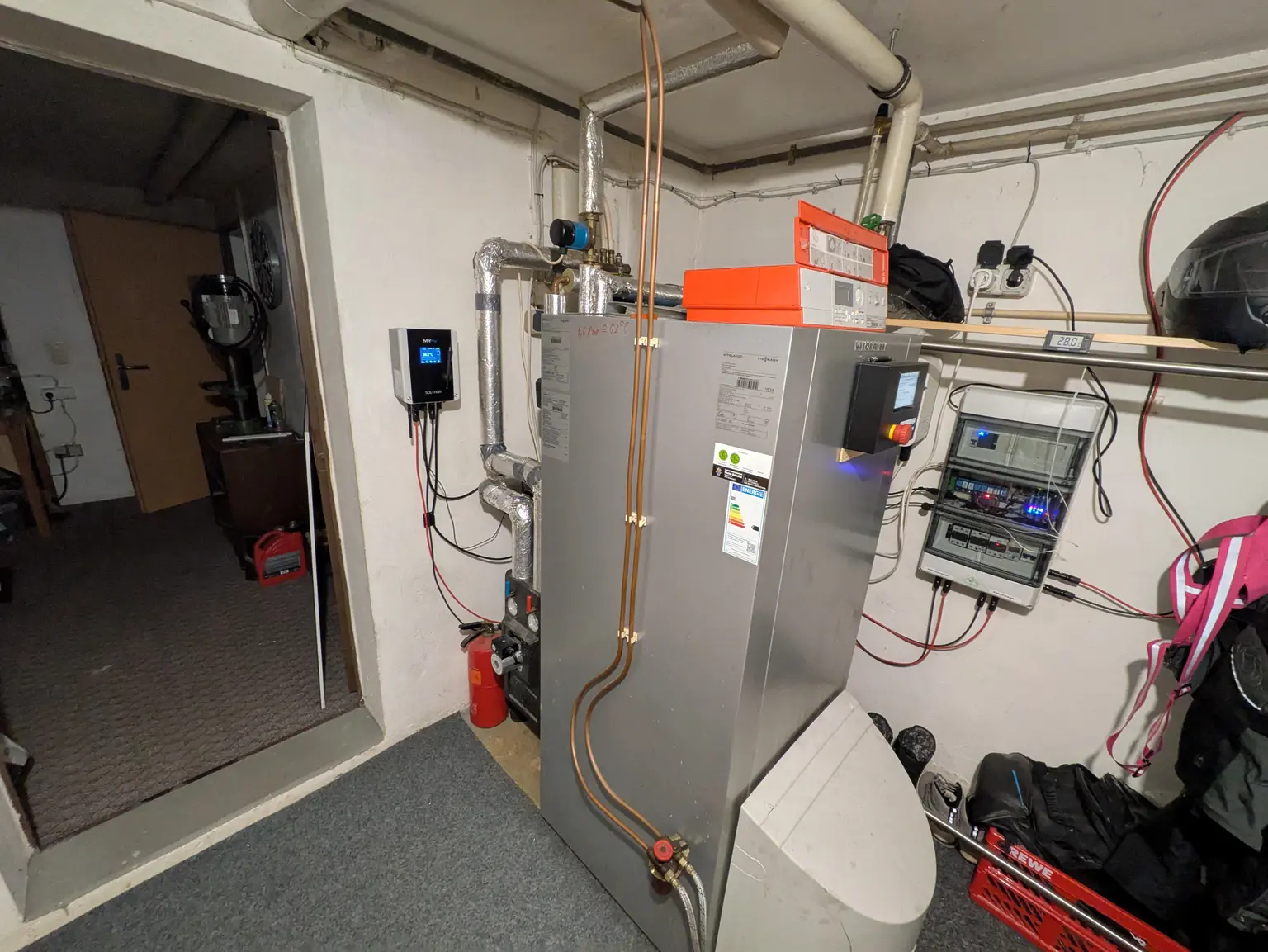 SOL•THOR installed in the basement for hot water generation, connected to a storage tank and powered by solar energy.