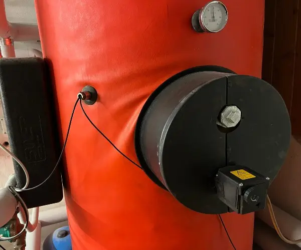 Water heater with connected heating rod.