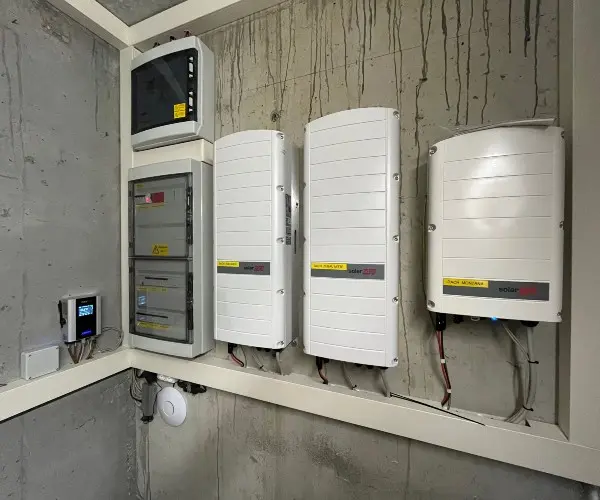 Wall-mounted AC•THOR 9s with switch cabinet and inverter.