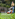 Woman mowing the lawn
