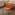 Orange chair in a meetingroom with text