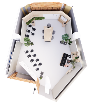Top view of a modern office layout with a central conference table, surrounding chairs, plants, and workstations along the walls.