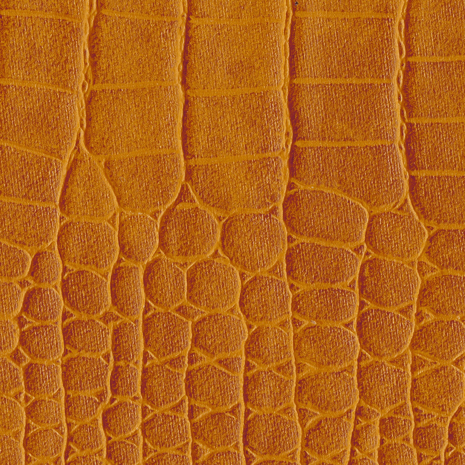 Una vista cercana de un material texturizado de color naranja que se asemeja a la piel de reptil, con escamas y crestas visibles.