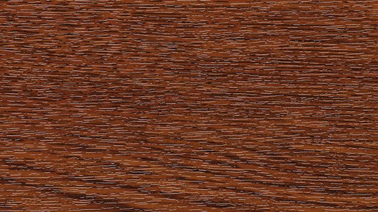 Eine Nahaufnahme einer braunen Holzoberfläche mit einer körnigen Textur und einigen schwarzen Linien.