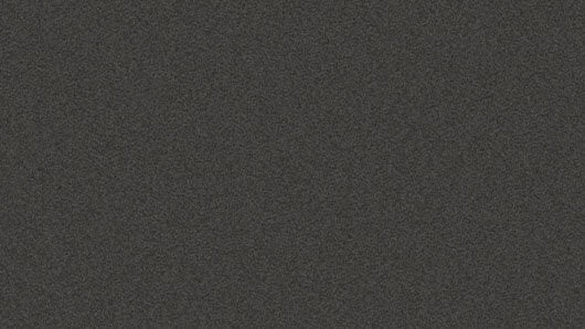 Eine Nahaufnahme einer strukturierten, dunkelgrauen Oberfläche, möglicherweise eine Stoff- oder Materialprobe.