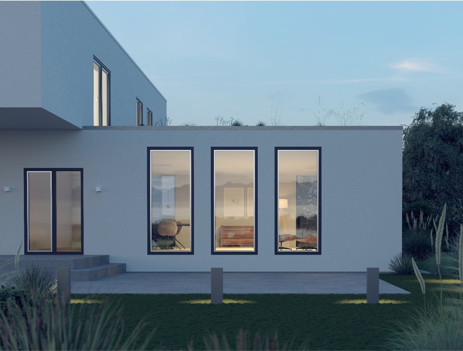Exterior de una casa moderna con grandes ventanas, un patio y un jardín bien cuidado durante el día.