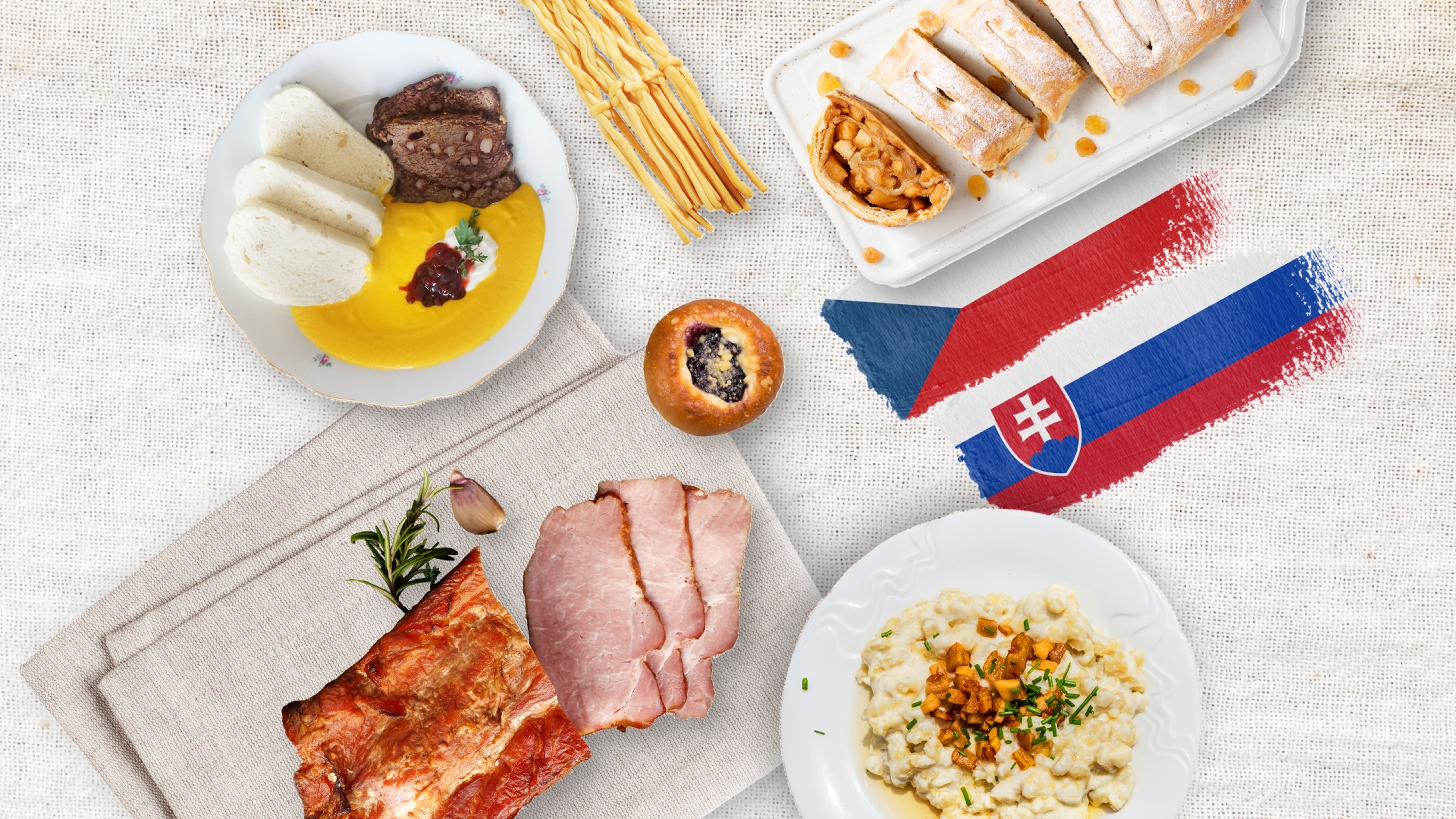 Typická česká a slovenská jídla a vlajky obou zemí v rámci česko-slovenských týdnů v Globusu
