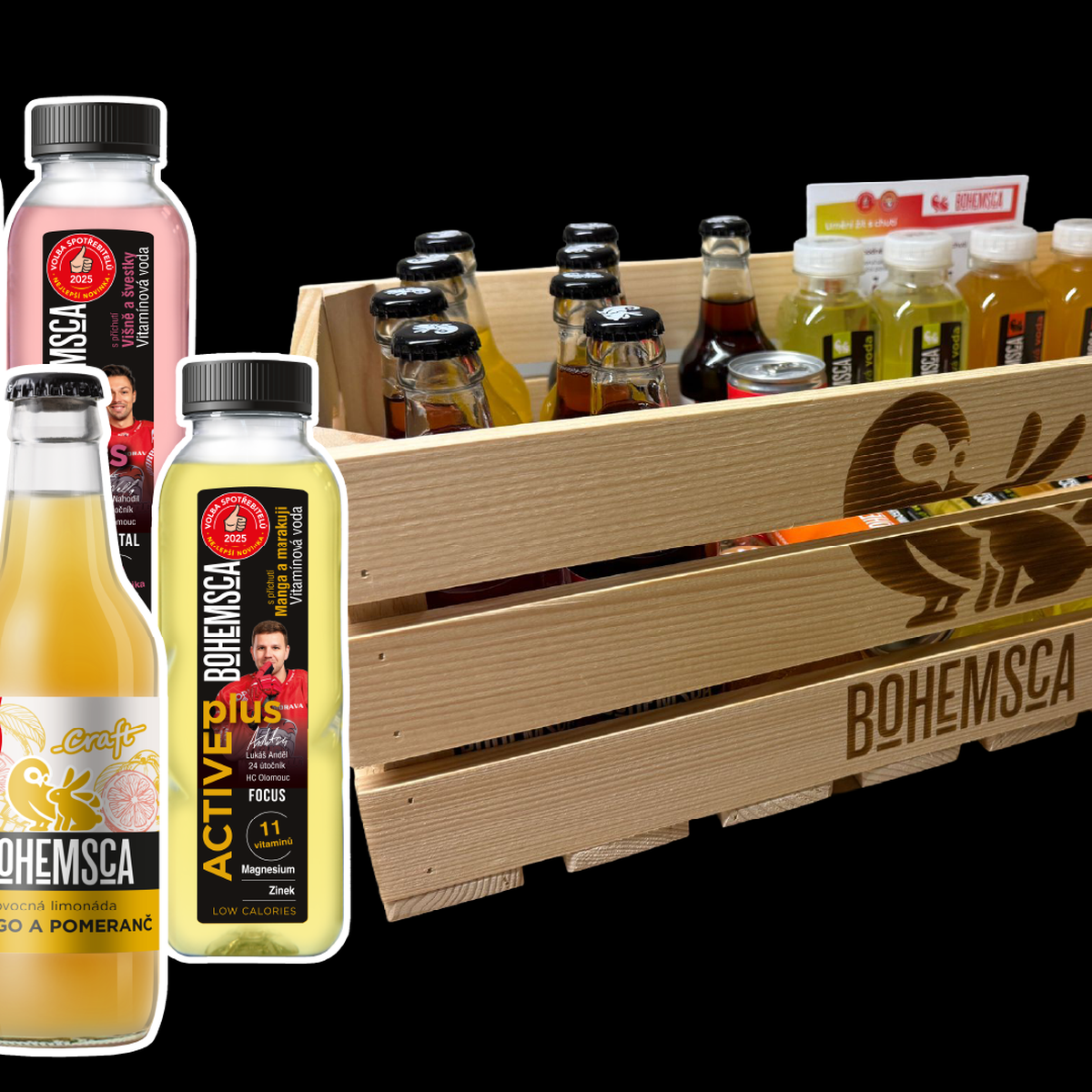 Dřevěná bedna naplněná nejrůznějšími nápoji Bohemsca, včetně lahví s příchutí mango-pomeranč a granátové jablko.