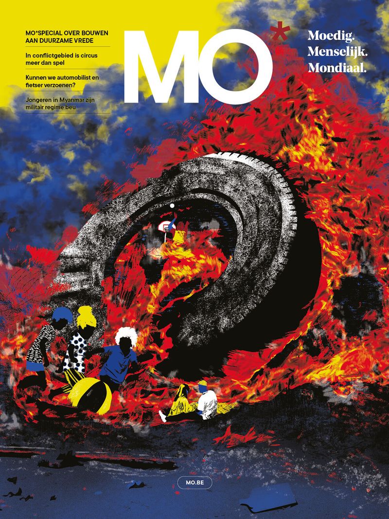 Magazine cover with bold "MO" title, showing vibrant colors and abstract imagery of fire and a large tire. Text in Dutch on the left side.