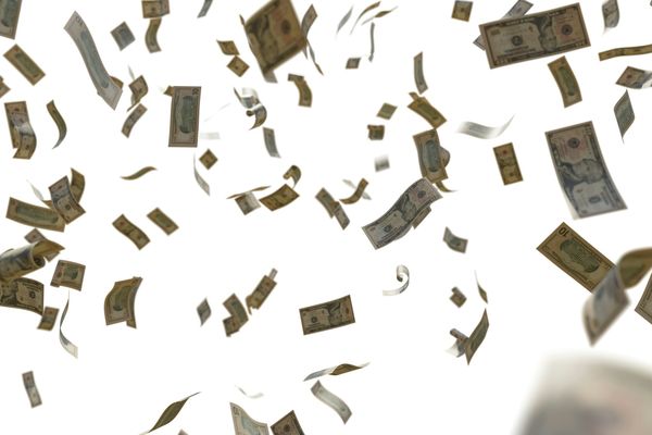 Floating banknotes on a white background, giving an impression of money raining down.