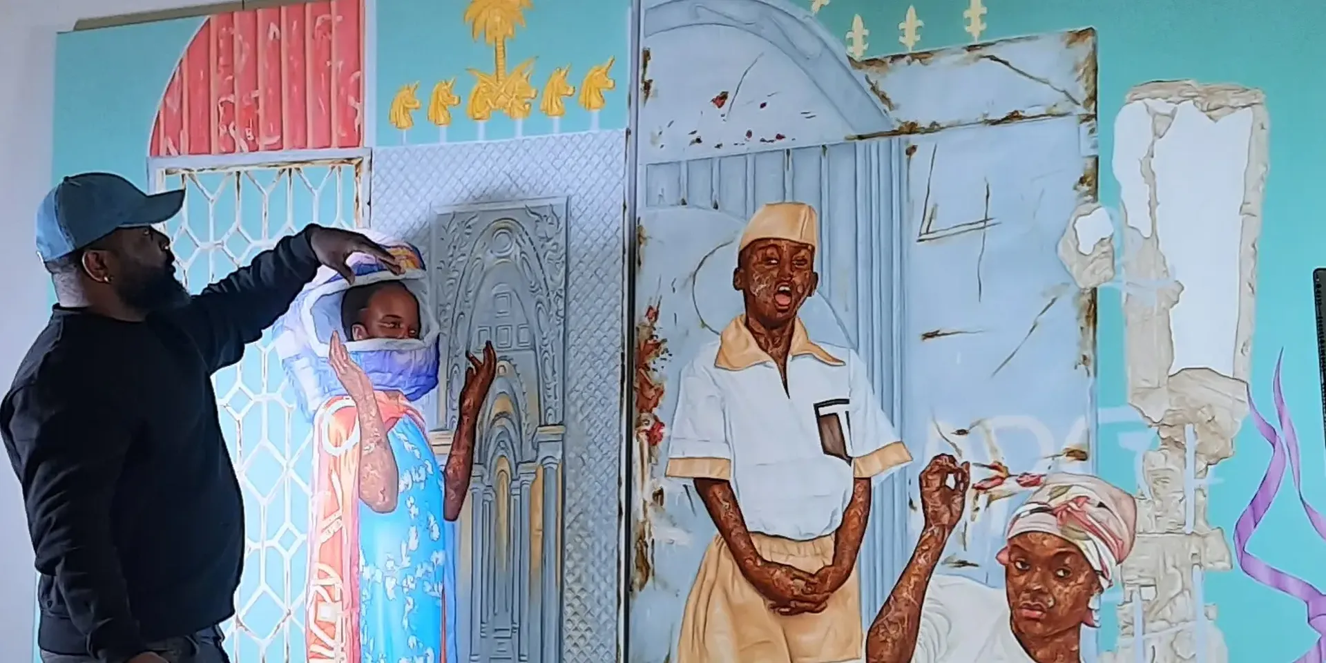 Hilary Balu aan het werk aan zijn schilderij 'La promesse du vide'