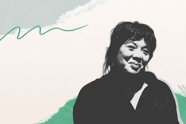 Black and white portrait of a person smiling, set against an abstract pastel background with green accents and wavy lines.