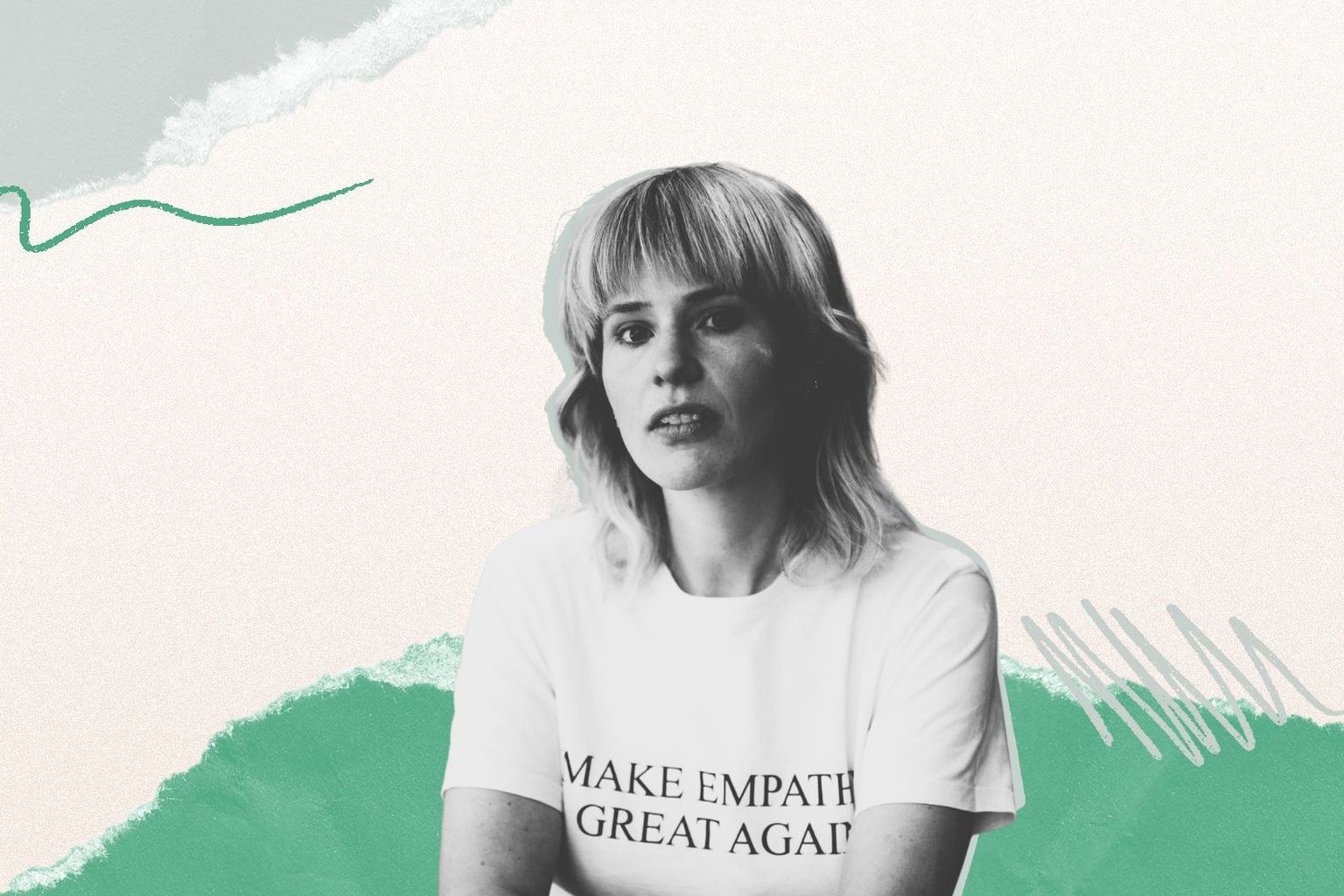 A woman with medium-length hair and bangs wears a t-shirt with "MAKE EMPATHY GREAT AGAIN" text, set against a textured green and beige background.