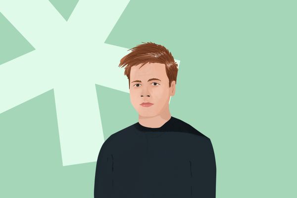 Illustration of a person with short brown hair wearing a dark shirt on a green background with an asterisk design.