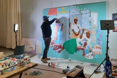 Hilary Balu aan het werk aan zijn schilderij 'La promesse du vide'