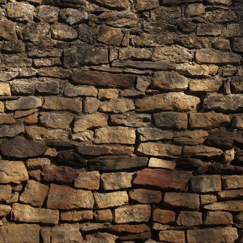 Mur de pierres sèches, éclairé par la lumière du soir - Atelier Tuffery