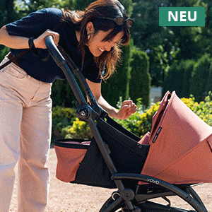 Eine Frau mit Sonnenbrille lächelt im Freien ein Baby in einem rosa Kinderwagen an. In der oberen rechten Ecke befindet sich ein „NEU“-Etikett.