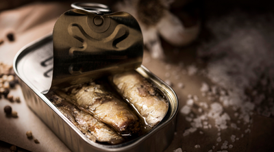 Fish in a tin with the lid open