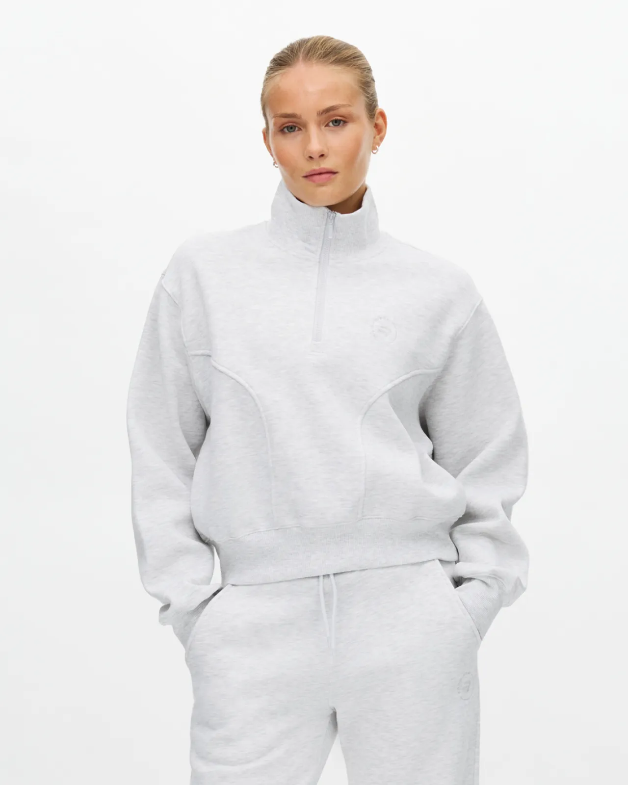 Woman in grey lounge wear outfit
