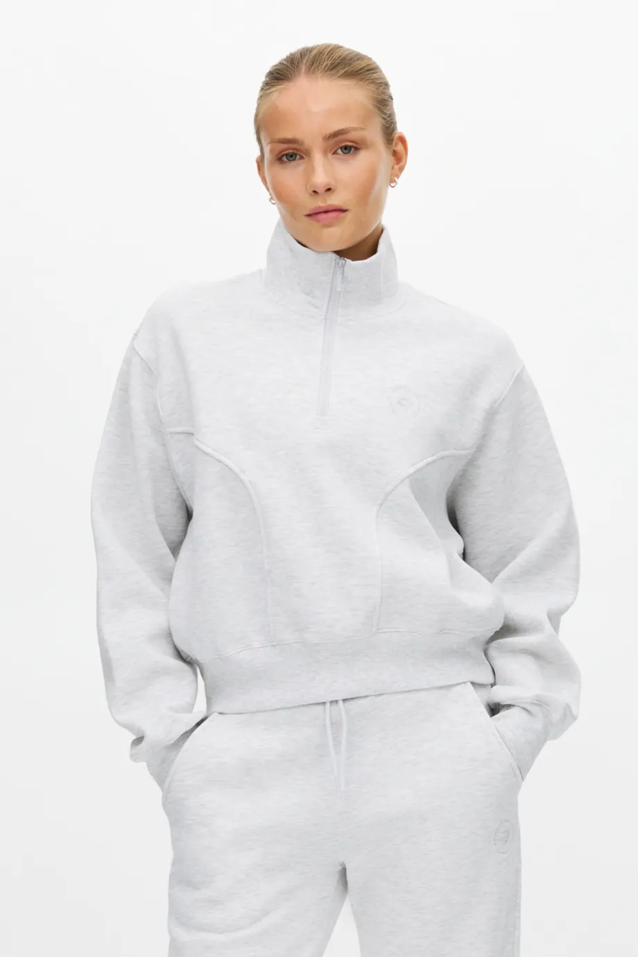 Woman in grey lounge wear outfit