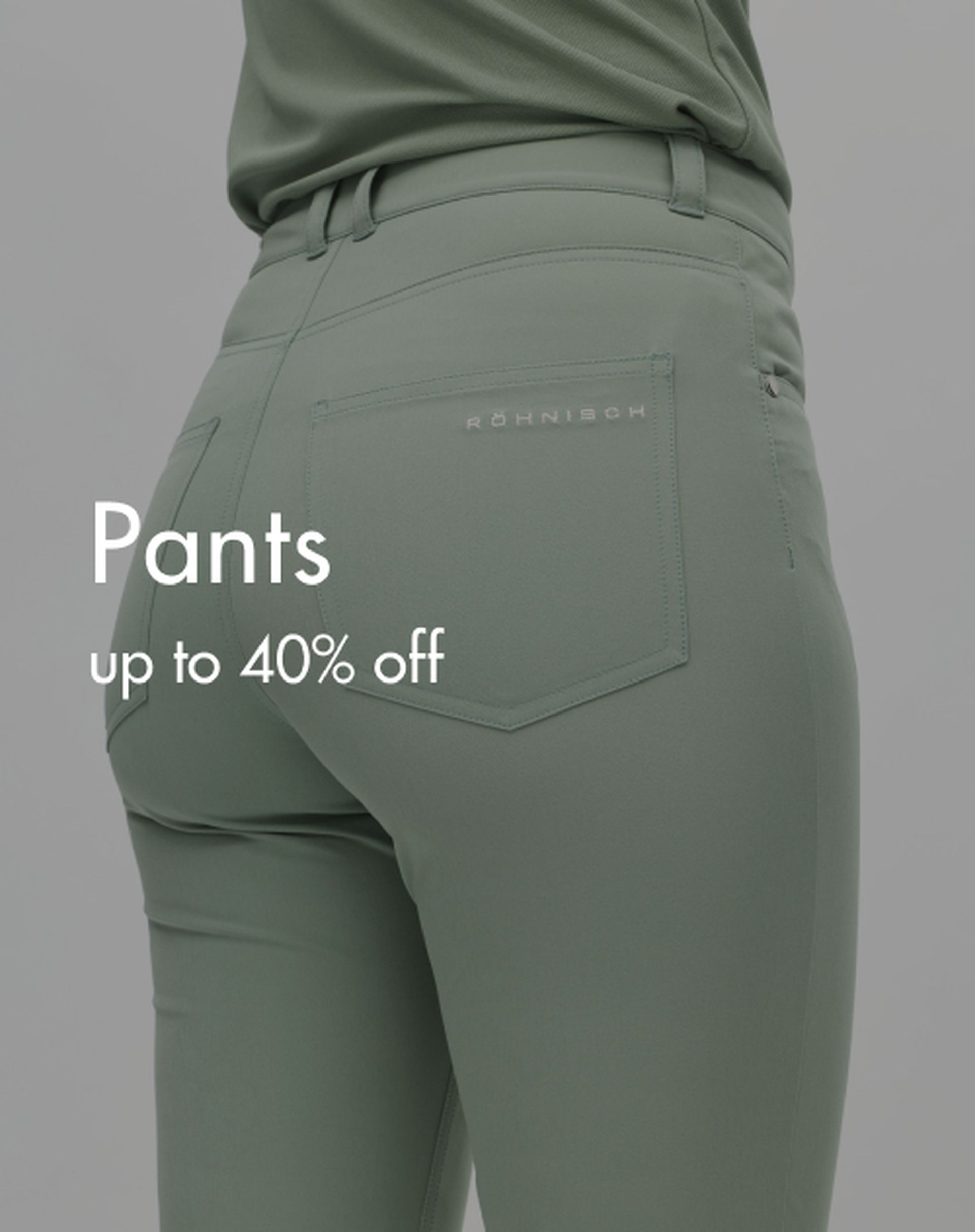 Close-up of a person wearing green pants with "Röhnisch" branding, text reads "Pants up to 40% off."