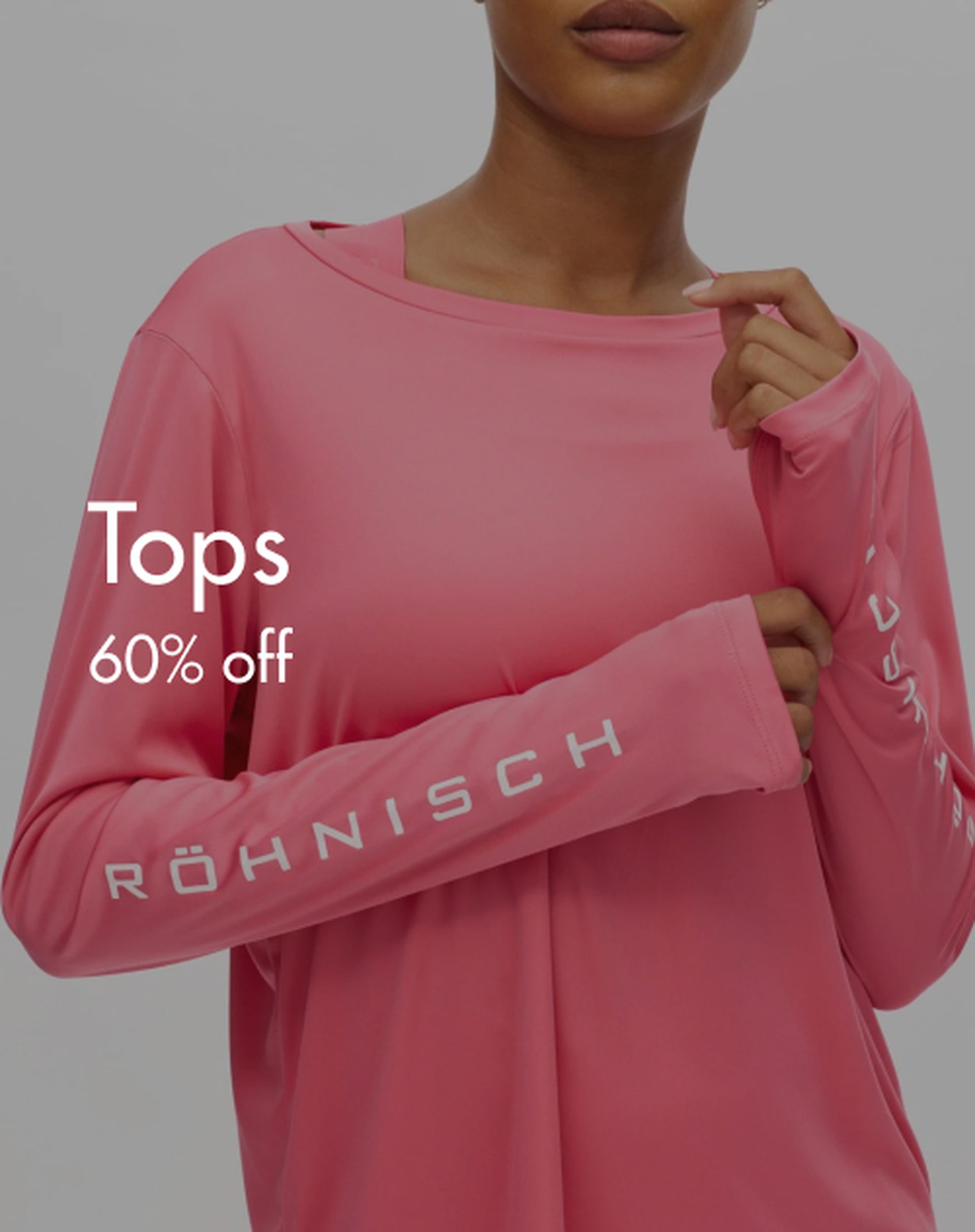 Woman wearing a pink long-sleeve top with text "Röhnisch" on the sleeves and "Tops 60% off" overlayed on the image.