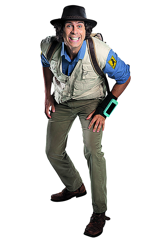 Andy from Andy's Adventures in his explorer kit, in a crouching pose smiling at the camera