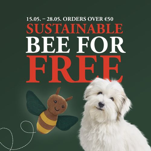 Promotional image with a cute plush bee and a fluffy white dog, offering a free sustainable bee with purchases over 50€ from 15.05 to 28.05.