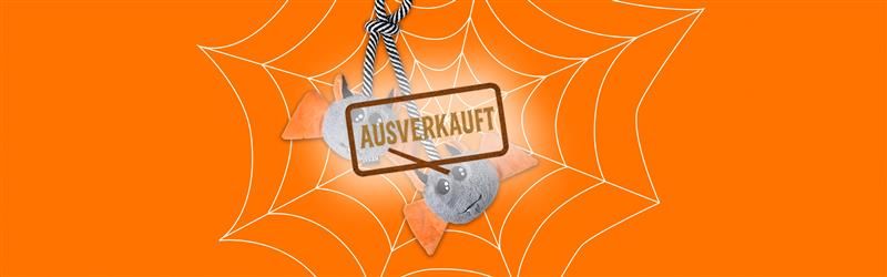 Zwei Fledermäuse auf einem Netz mit einem „AUSVERKAUFT”-Stempel vor orangefarbenem Hintergrund.