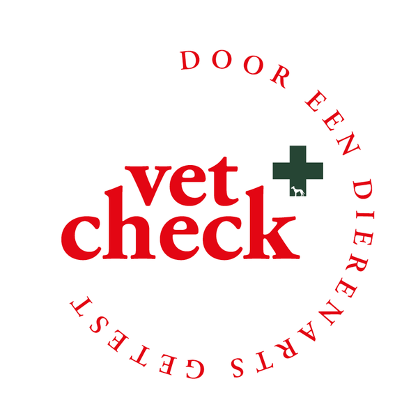 Rond logo met de tekst “vet check” in rode letters en een groen kruis, omgeven door de tekst “DOOR EEN DIERENARTS GETEST” in rode letters.