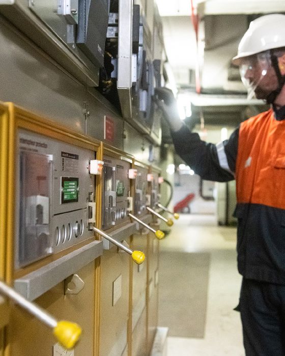 ArcelorMittal employees wearing Alsico PPE workwear for industrial safety collaboration.