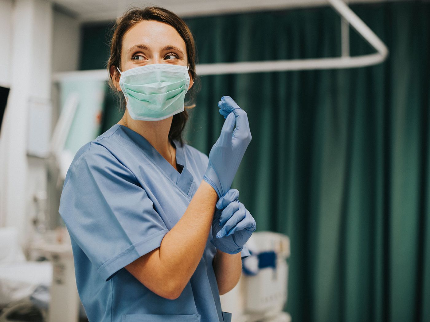 Nurse in medical scrubs, representing essential healthcare uniforms for professionals.
