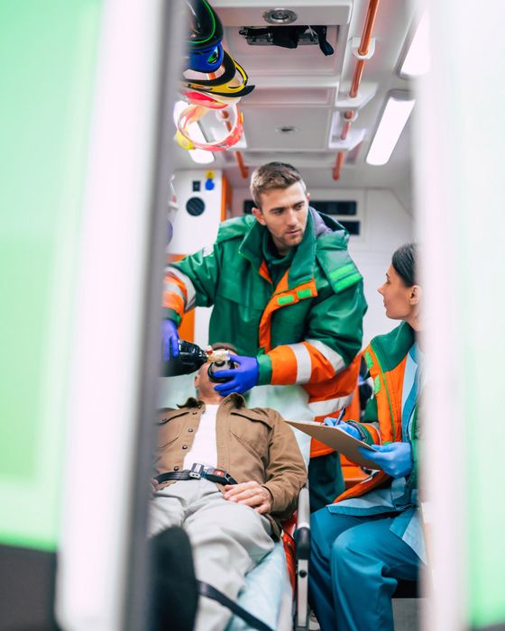 Healthcare worker wearing high-visibility PPE for construction safety, highlighting Alsico's range.