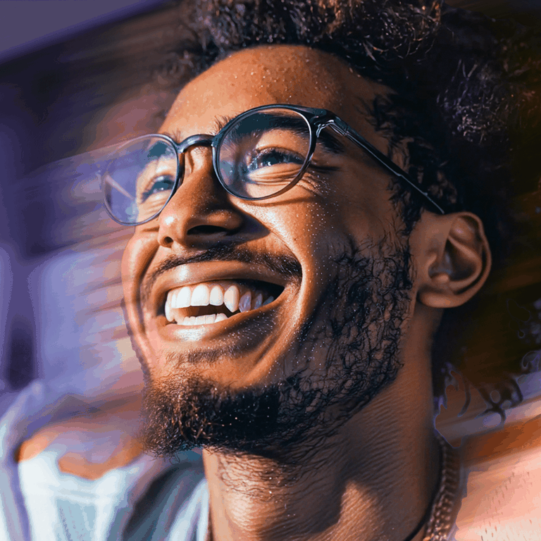 Smiling sports fan man with glasses and a beard, looking upward. Background has a colorful, blurred motion effect.