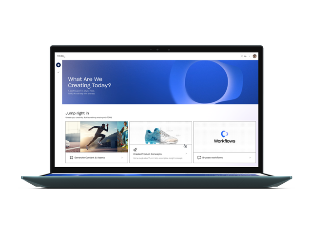 Laptop displaying TORQ landing page with sections titled "What Are We Creating Today?" and options like "Generate Content" and "Workflows."