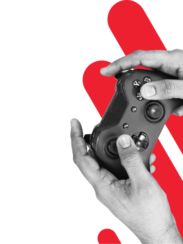 A pair of hands hold an game controller.