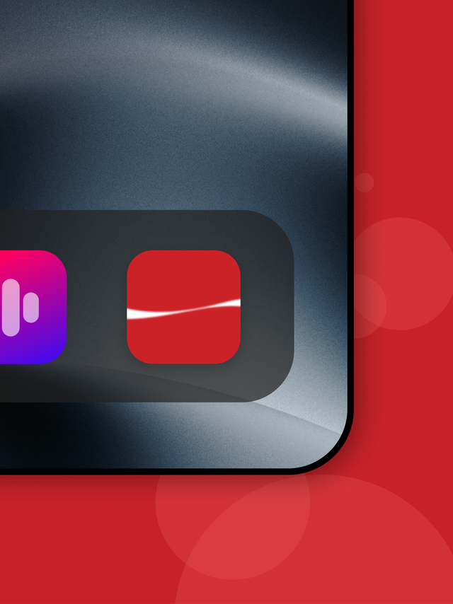 A close-up of a mobile phone on a red background that shows the red Coca Cola app button